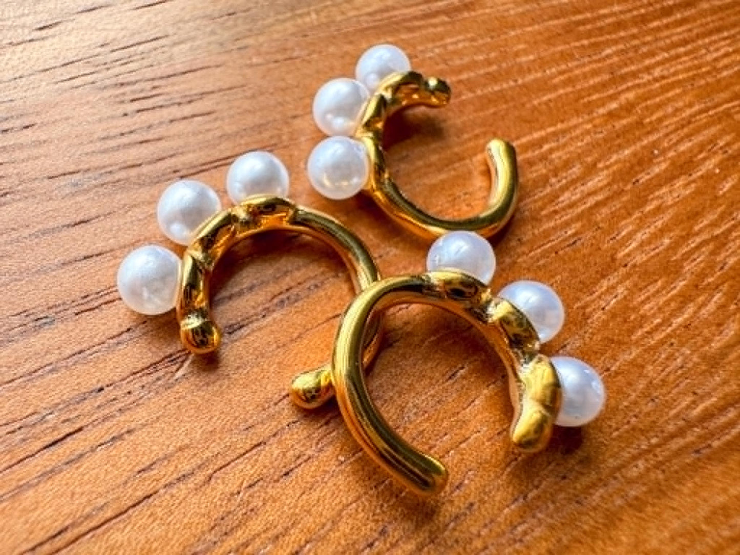 Gold faux pearl ear cuff with four pearl detail