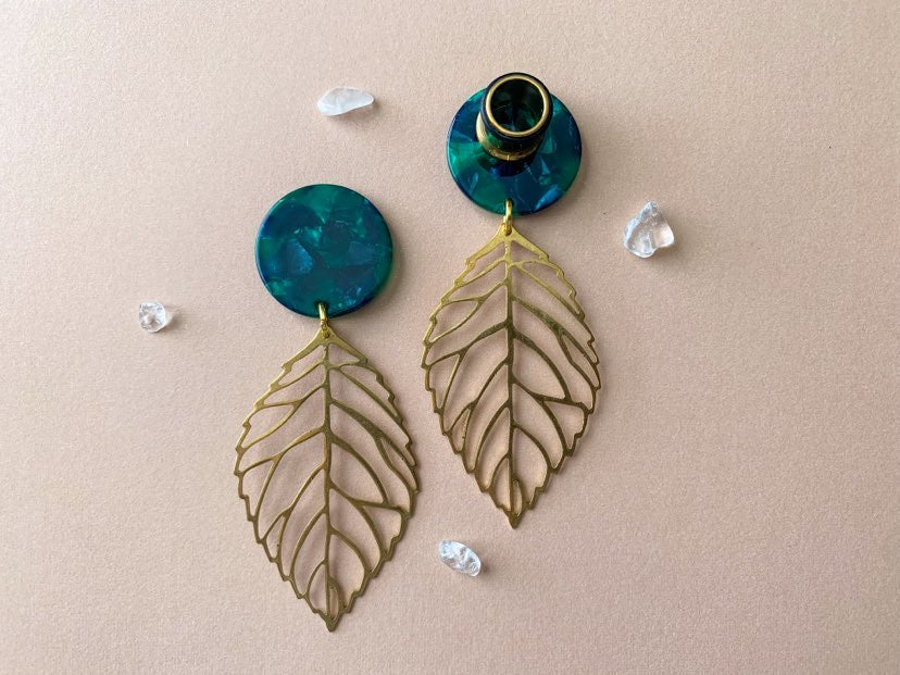 Green Disc With Gold Leaf Dangle