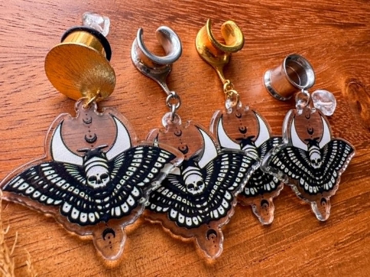 Acrylic moth and moon plug earrings for stretched ears