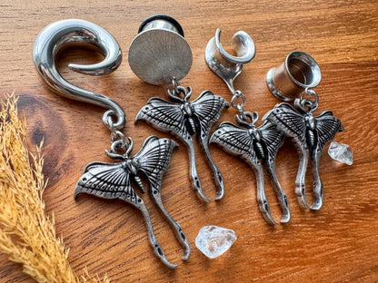 Antique silver luna moth plug earrings with detailed winged moth charms for stretched ears.