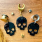 Black Shiny Skulls Plug Earrings