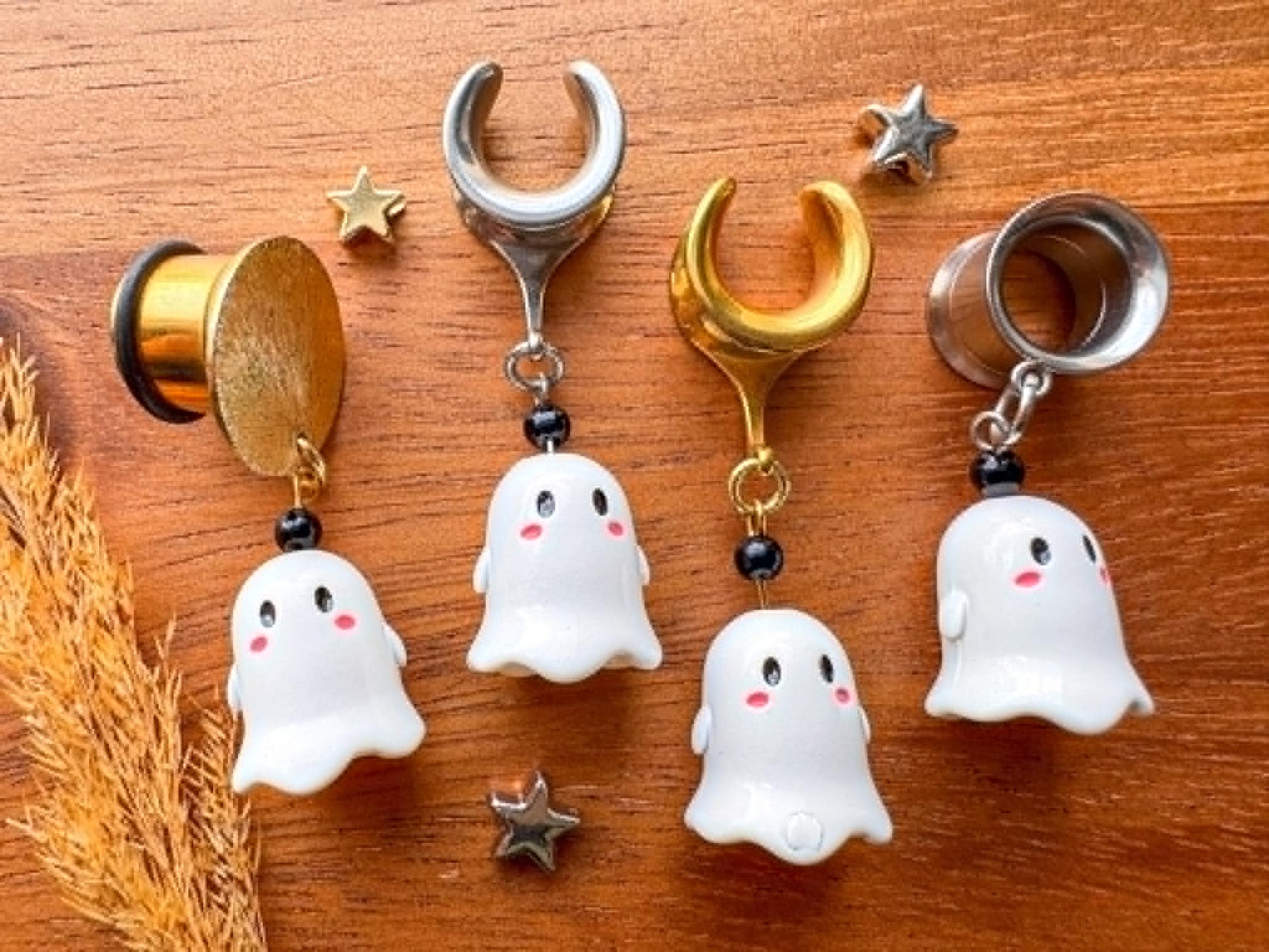 Cute blushing ghost plug earrings with playful white ghost charms and rosy cheeks for stretched ears.