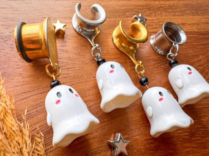 Cute blushing ghost plug earrings with playful white ghost charms and rosy cheeks for stretched ears.