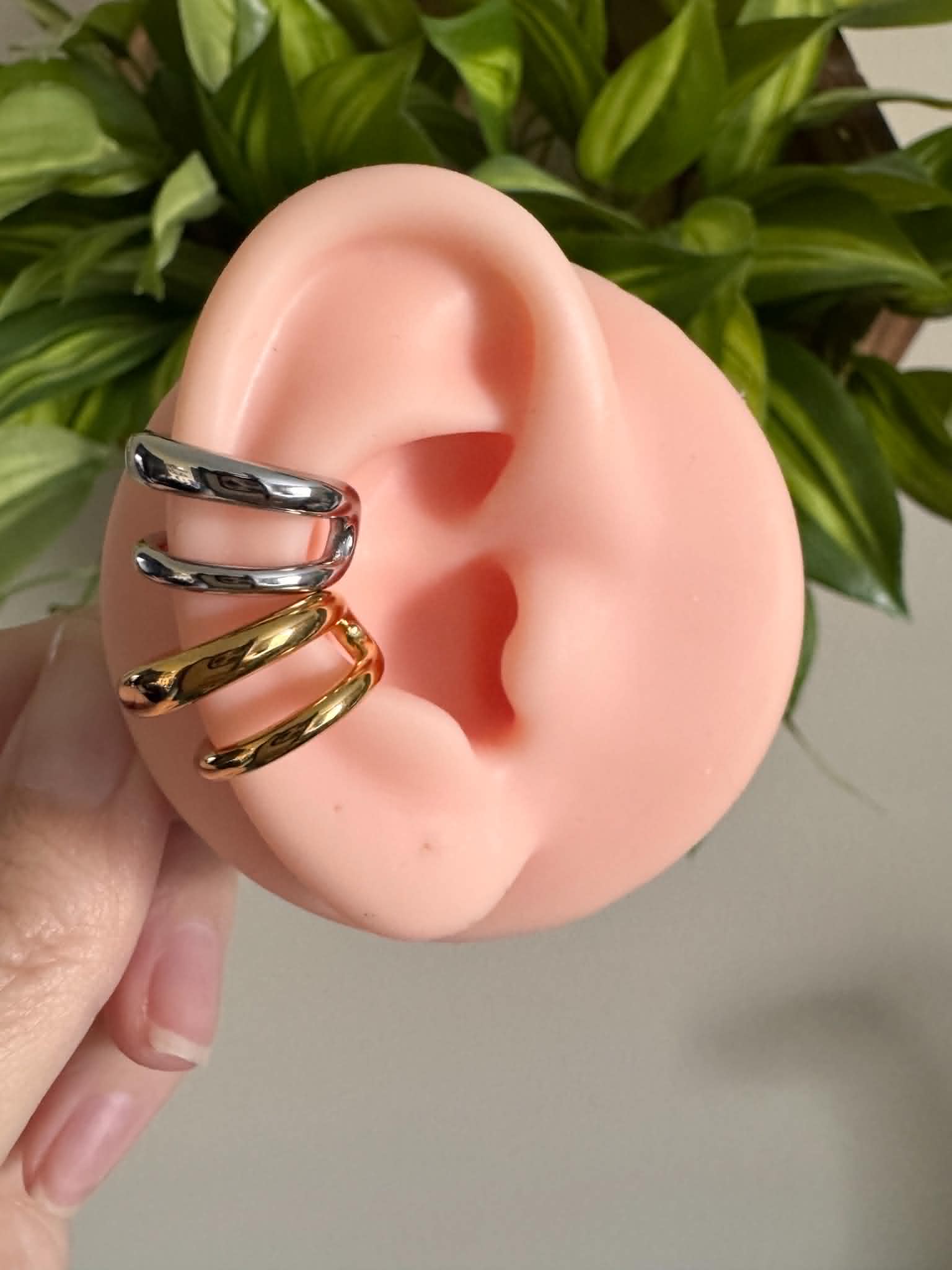 Silver and gold double band ear cuff with a minimalist stacked design, no piercing required.