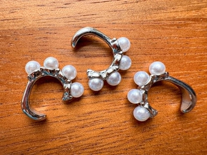 Silver faux pearl ear cuff with four pearl detail