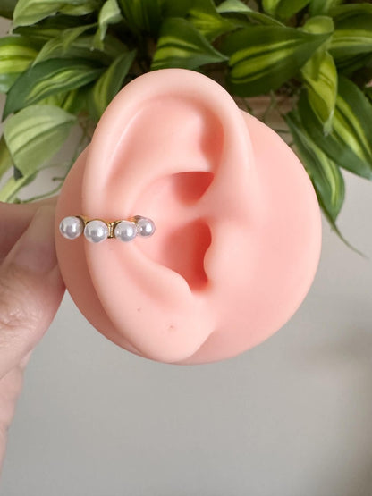 Gold faux pearl ear cuff with four pearl detail