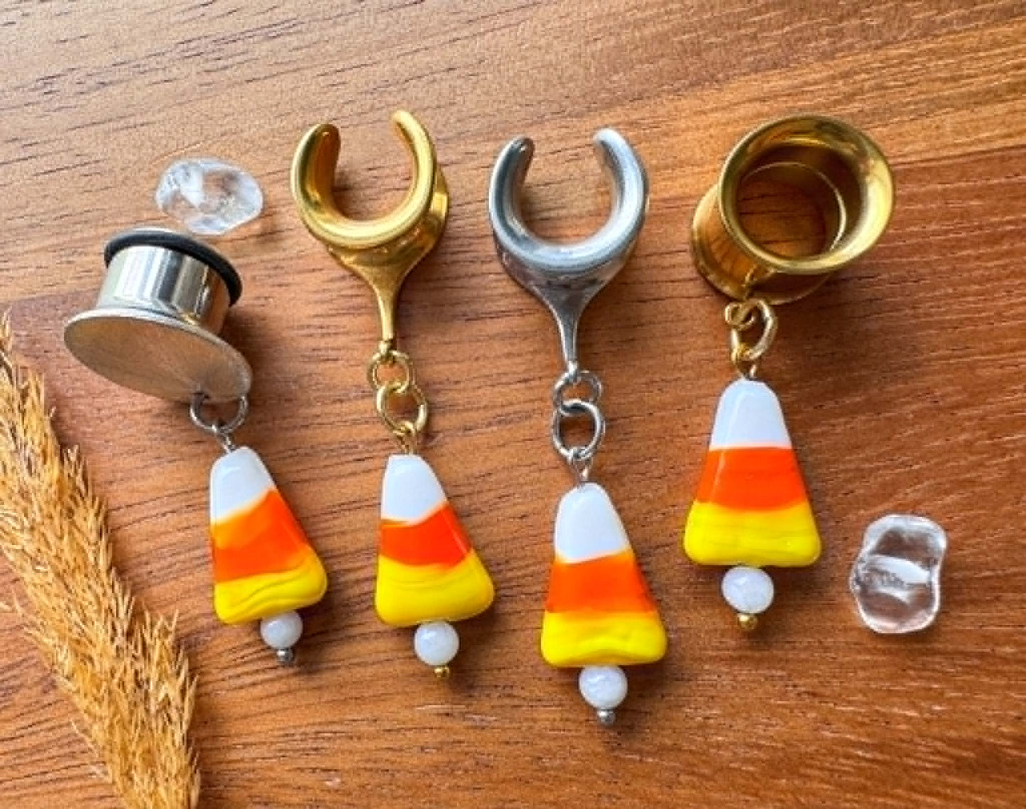 Glass candy corn plug earrings for stretched ears