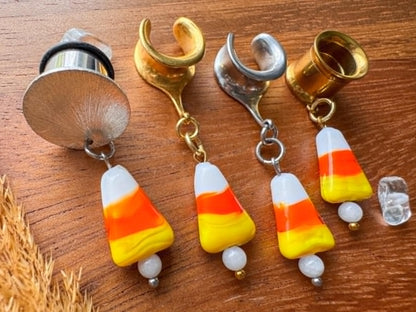 Glass candy corn plug earrings for stretched ears