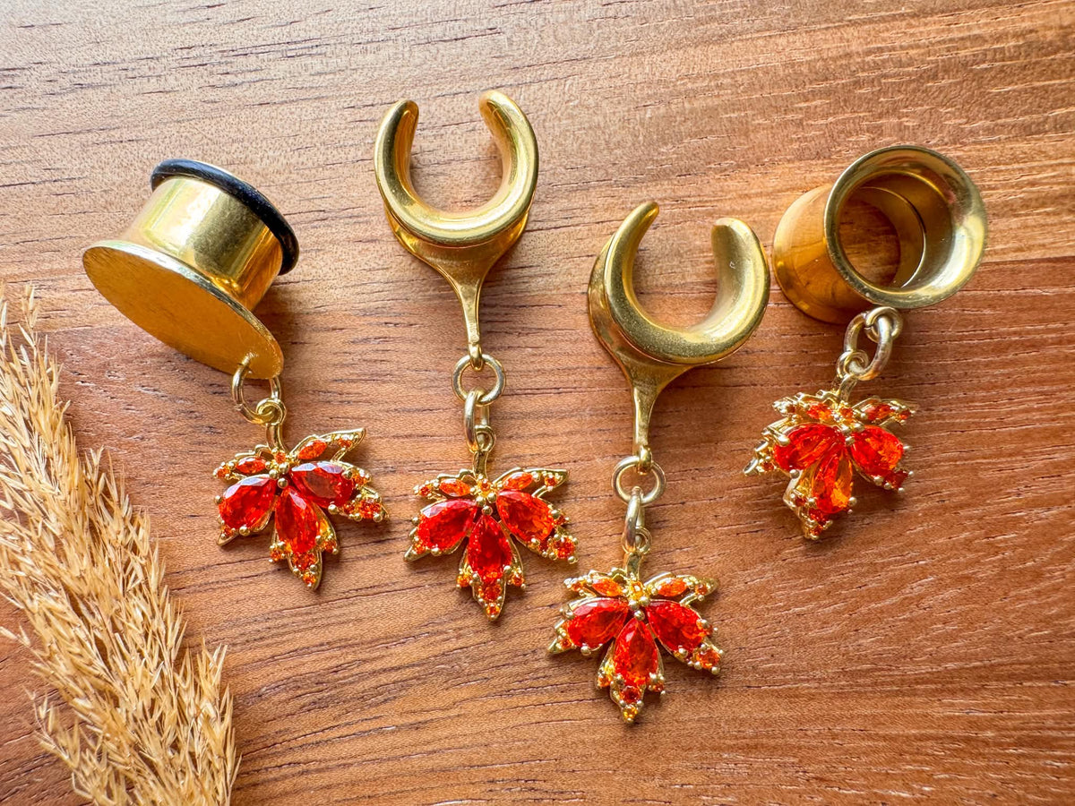 Gold maple leaf plug earrings with detailed autumn leaf dangles for stretched ears.