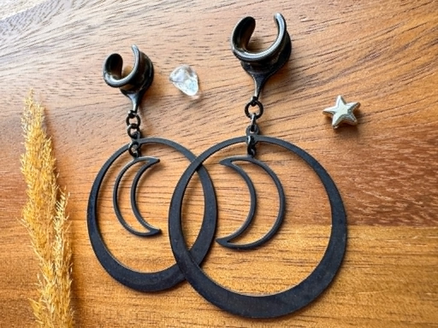 Midnight Eclipse black crescent moon hoop plug earrings for stretched ears