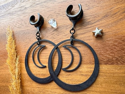 Midnight Eclipse black crescent moon hoop plug earrings for stretched ears