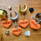 Orange Trick or Treat Hearts Plug Earrings