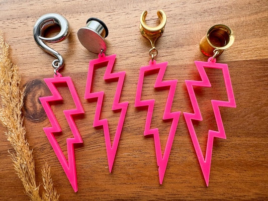Pretty in Pink Lightning Bolt dangling plug earrings featuring playful pink lightning bolt charms for stretched ears.