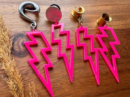 Pretty in Pink Lightning Bolt dangling plug earrings featuring playful pink lightning bolt charms for stretched ears.