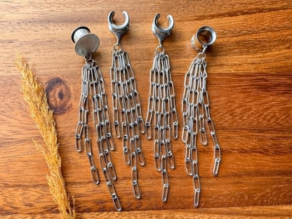 Silver chain plug earrings with long dangling chain accents for stretched ears.