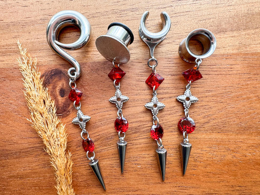 Silver Crimson Afterglow dangling plug earrings featuring rich crimson red accents and silver-tone details for stretched ears.