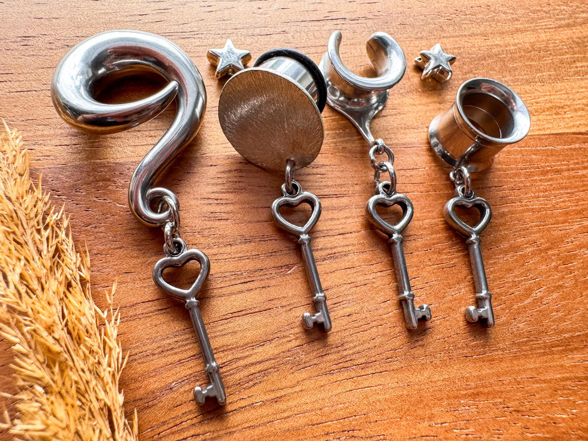 Silver Key to My Heart dangling plug earrings featuring romantic heart and key charms with vintage-inspired silver-tone details for stretched ears.