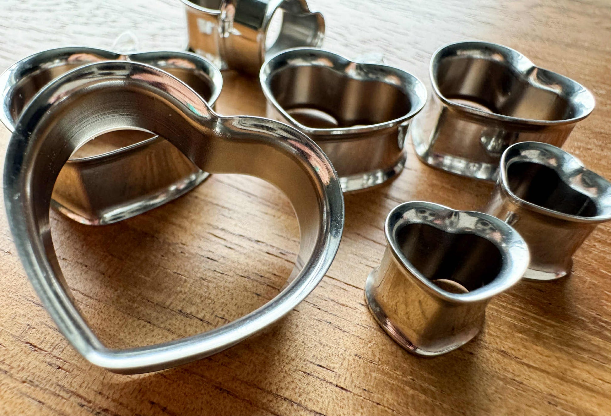 Silver Steel Heart Plug Earrings