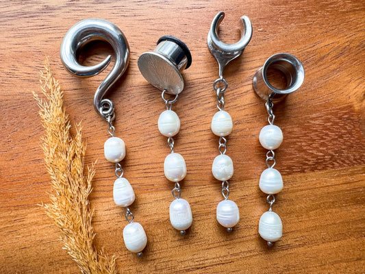 Silver pearl plug earrings with three cascading white pearl beads for stretched ears.