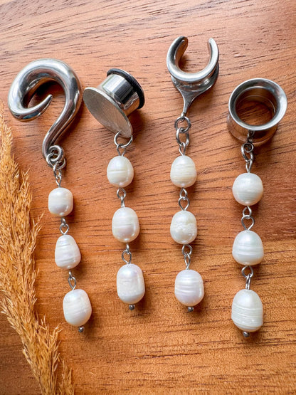 Silver pearl plug earrings with three cascading white pearl beads for stretched ears.